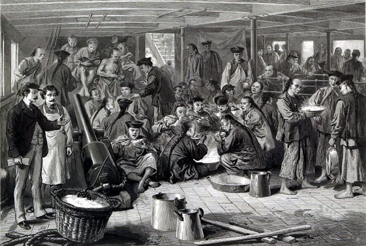 A boat interior, crowded with immigrants from China