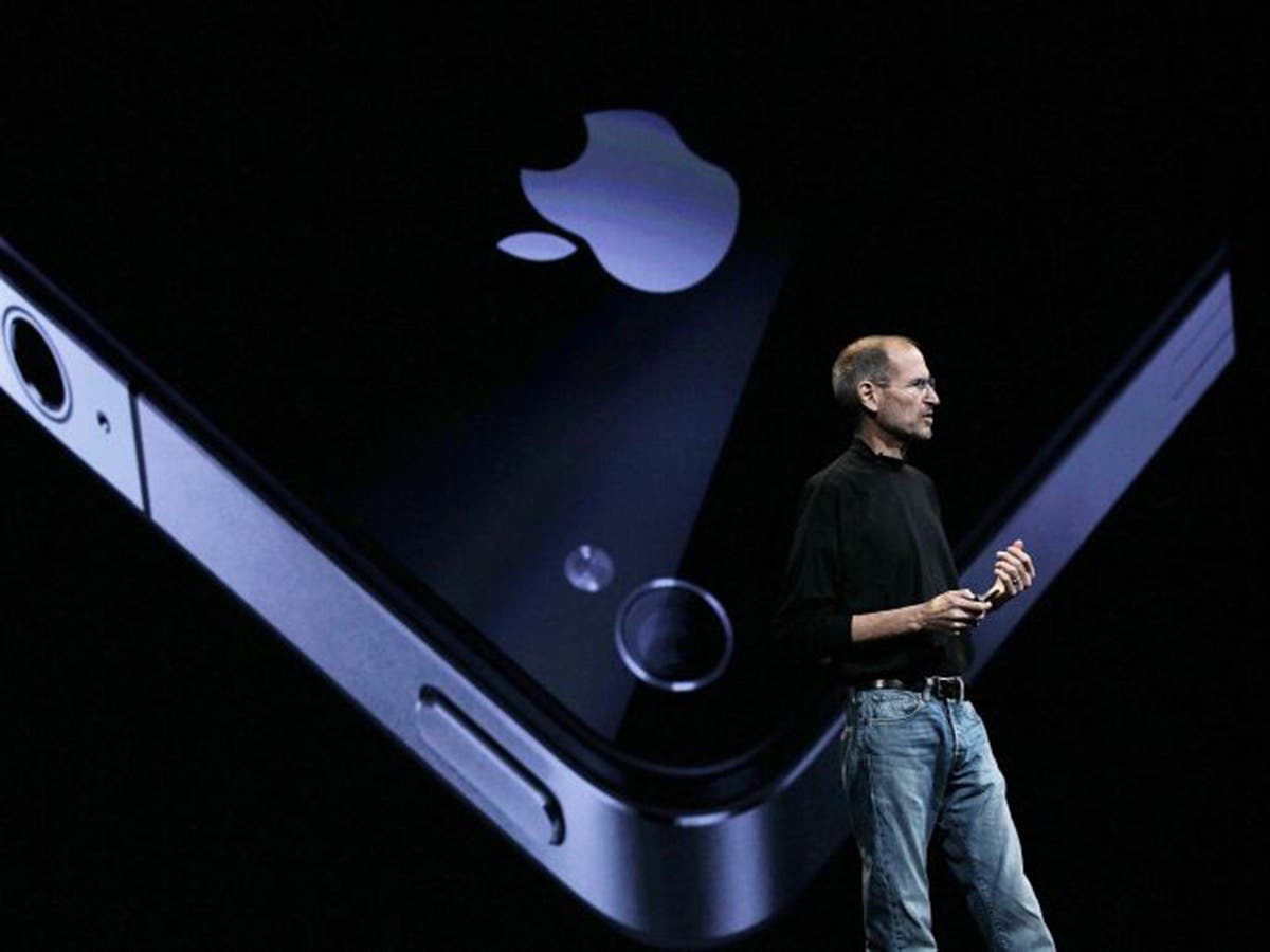 Steve Jobs unveiling an iPhone